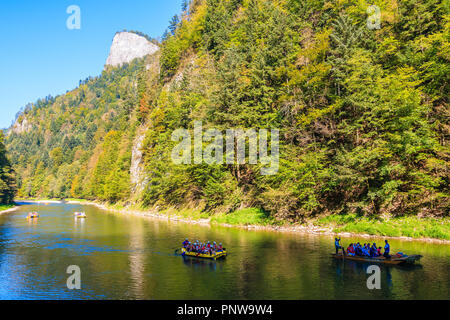 Rafts with tourist on Dunajec river in autumn landscape of Pieniny Mountains, Poland Stock Photo