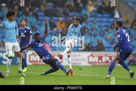 Manchester City's Riyad Mahrez scores his side's fifth goal of the game during the Premier League match at The Cardiff City Stadium. Stock Photo