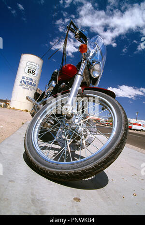 USA. Arizona, Kingman, Route 66. Low viewpoint close up of classic Harley-Davidson motorcycle. Stock Photo