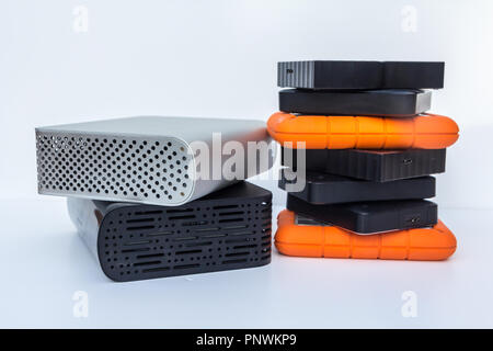 different kinds of external computer storage hard drives - isolated on white background Stock Photo