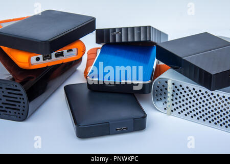 different kinds of external computer storage hard drives - isolated on white background Stock Photo