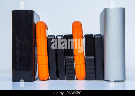 different kinds of external computer storage hard drives - isolated on white background Stock Photo