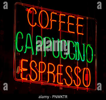 A neon sign in a cafe for differnt types of coffee on sale Stock Photo