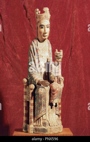 Romanesque. Virgin with Holy Child. Polychrome carving from the 12th century. Uncertain origin, from Catalonia. National Art Museum of Catalonia, Barcelona, Catalona, Spain. Stock Photo
