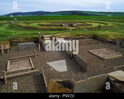 View S of the reconstructed central house (House 2) with 'temple' to rear at Barnhouse Neolithic settlement beside Stenness circle-henge, Orkney, UK. Stock Photo