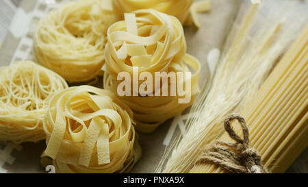 Spaghetti in shape of rolls Stock Photo