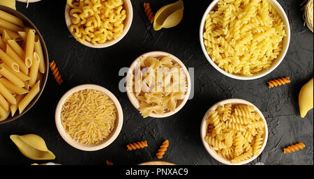 Top view of pasta in bowls Stock Photo