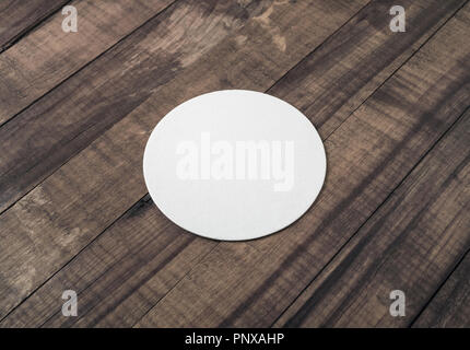 Blank beer coaster mockup on wood table background Stock Photo Alamy