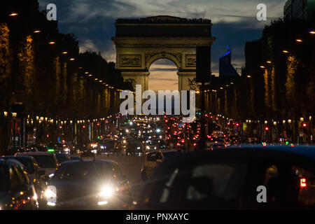 Avenue des Champs Elysees and Arc de Triomphe at night, Paris Stock Photo -  Alamy