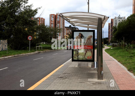 Bogotá, Colombia - May 01, 2017: Looking down Calle 152 or Street 152, in the Capital city of Bogotá in Colombia. To the right is a Bus Stop. Stock Photo