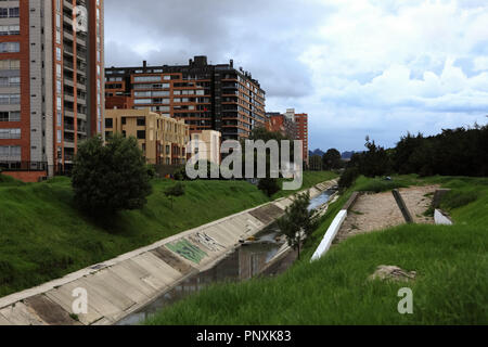 Bogotá, Colombia - May 01, 2017: Looking at a cemented canal that goes down Calle 152 or Street 152. it was once perhaps a little stream. Stock Photo