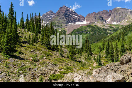 Maroon Bells - A close-up spring view of rugged Maroon Bells, seen from Crater Lake Trail, Aspen, Colorado, USA. Stock Photo