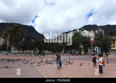 Bogotá, Colombia - May 28, 2017:  The view across the Parque de Las Periodistas in the Las Aguas area towards the Andean peaks of Monserrate. Stock Photo