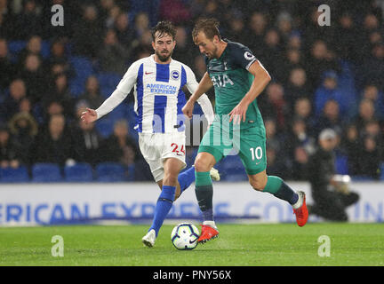 Brighton & Hove Albion's Davy Propper (left) and Tottenham Hotspur's Harry Kane (right) battle for the ball during the Premier League match at the AMEX Stadium, Brighton.