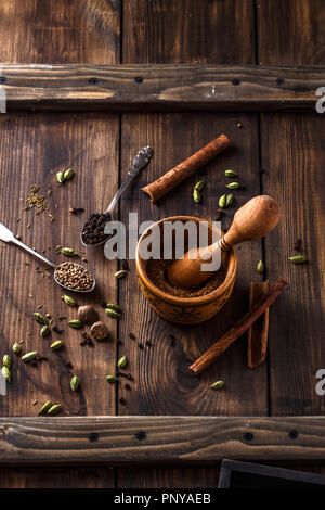 Tradition indian garam masala with assorted ingridients Stock Photo