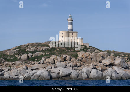 Lighthouse on the Isola dei Cavoli near Villasimius, Sardinia, Italy Stock Photo