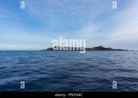 Lighthouse on the Isola dei Cavoli near Villasimius, Sardinia, Italy Stock Photo