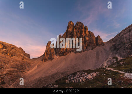 Awesome sunset on beautiful Dolomite mountain causing enrosadira effect, South Tyrol, Italy Stock Photo