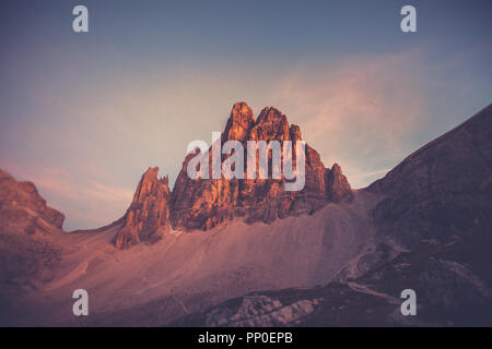 Vintage effect of sunset on Dolomite mountain, South Tyrol, Italy Stock Photo
