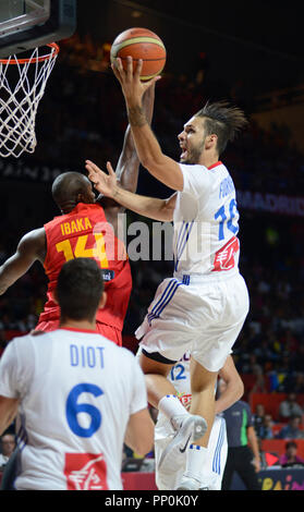 Evan Fournier (France) scoring against Serge Ibaka (Spain). FIBA World Cup Spain 2014 Stock Photo