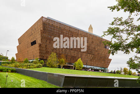 Washington DC, USA - September 14, 2018: National Museum of African American History and Culture exterior street view with Washington Monument in the  Stock Photo