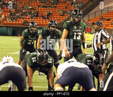 September 22, 2018 - Hawaii Rainbow Warriors running back Fred Holly III #21, Hawaii Rainbow Warriors running back Dayton Furuta #7 and Hawaii Rainbow Warriors quarterback Cole McDonald #13 line up for a goal line play during a game between the Hawaii Rainbow Warriors and the Duquesne Dukes at Aloha Stadium in Honolulu, HI - Michael Sullivan/CSM Credit: Cal Sport Media/Alamy Live News Stock Photo