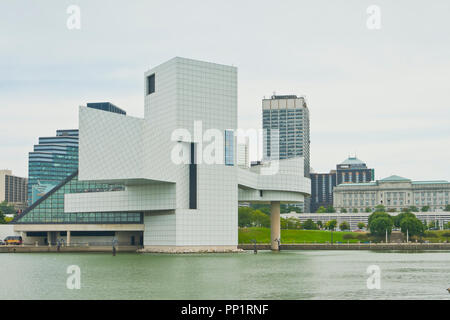 CLEVELAND - AUGUST 26: View of the Cleveland skyline from Voinovich Park, featuring the Rock-and-Roll Hall of Fame museum on a mostly cloudy summer da Stock Photo
