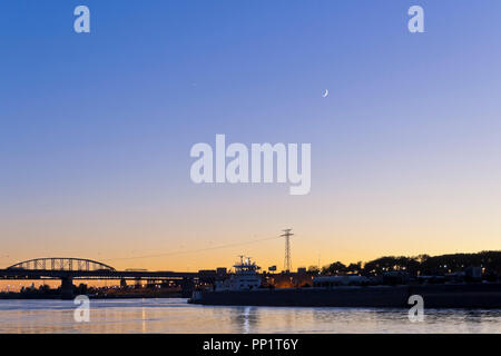 EAST ST. LOUIS, IL - OCTOBER 7: Venus and two-day-old crescent moon in conjuction over downtown St. Louis on 2013 Oct. 7. Stock Photo