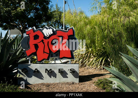 A logo sign outside of the headquarters of Riot Games, Inc., in Los ...