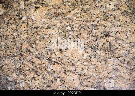 Seamless granite texture with yellow and black color, can be used as a background Stock Photo