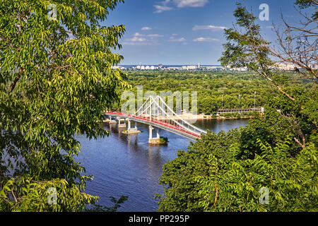 Aerial view to walking bridge crossing Dnepr river in Kiev, Ukraine Stock Photo