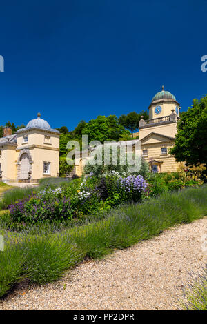 Impressive Palladian architecture and colourful planting at Castle Hill House and Gardens, near Filleigh, Devon, England, UK Stock Photo