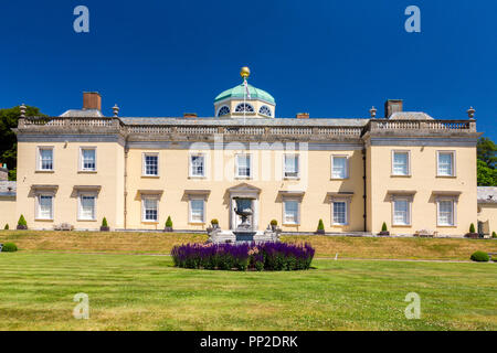 Impressive Palladian architecture and colourful planting at Castle Hill House and Gardens, near Filleigh, Devon, England, UK Stock Photo