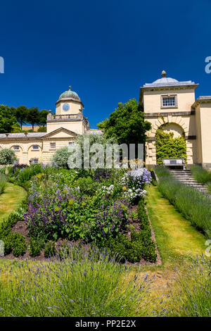 Impressive Palladian architecture and colourful planting at Castle Hill House and Gardens, near Filleigh, Devon, England, UK Stock Photo