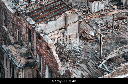 Color toned picture of a destroyed building, disaster concept. Stock Photo
