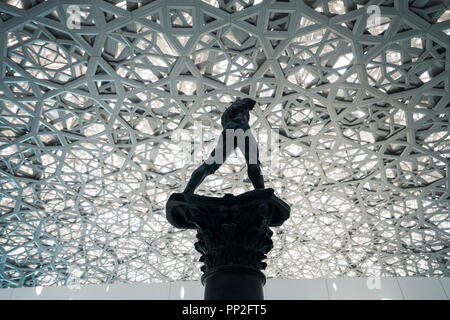 Sculpture Walking Man, On a Column by Auguste Rodin at Louvre Abu Dhabi, UAE Stock Photo