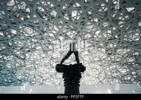 Sculpture Walking Man, On a Column by Auguste Rodin at Louvre Abu Dhabi, UAE Stock Photo