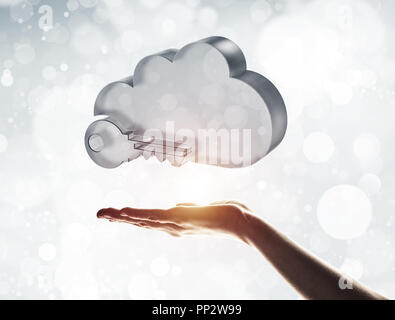 Cloud computing concept with glass symbol shown in hand Stock Photo