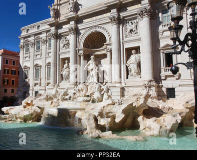 Image of the Trevi Fountain depicting the Taming of the Waters in the Piazza di Trevi, Rome, Italy.The backdrop for the fountain is the Palazzo Poli.  Stock Photo