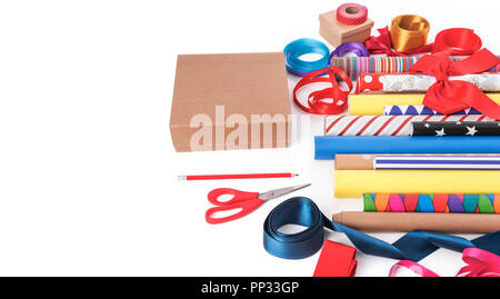 Colorful paper and ribbons for gift wrapping. Stock Photo