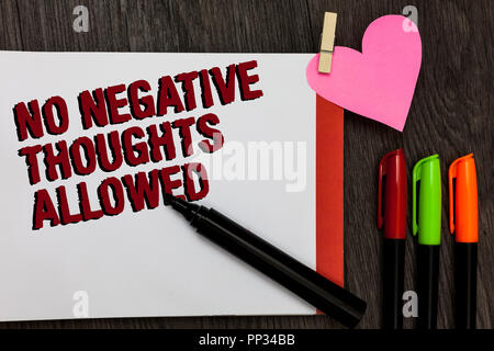 Writing note showing No Negative Thoughts Allowed. Business photo showcasing Always positive motivated inspired good vibes Bold red words pen on page  Stock Photo