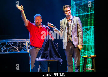 Magician and illusionist ADAM TRENT performs in Durham, North Carolina as part of his 2018 Tour.   Adam Trent is part of The Illusionists.   The Illusionists is a touring magic production which features a rotating cast of 5 to 8 magicians who all specialise in specific branches of magic from stage illusions to mind reading to escapology and comedic magic Stock Photo