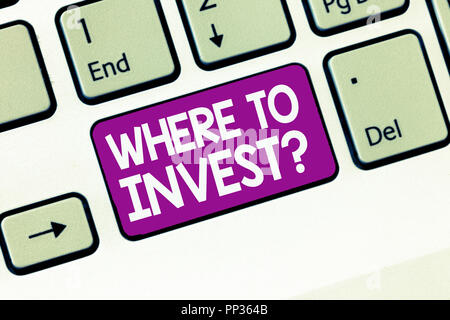Handwriting text writing Where To Invest question. Concept meaning asking someone about place to put money into. Stock Photo