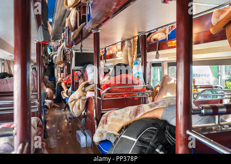 Onboard a Chinese intercity sleeper bus Stock Photo