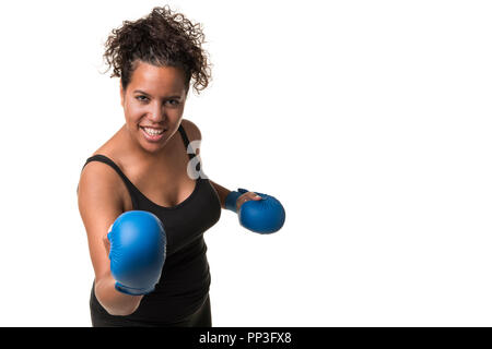 Young pretty black woman with blue boxing gloves working out isolated on a white background Stock Photo