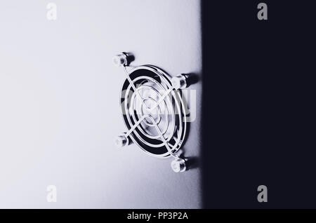 Cooling CPU cooler on a dark casing. Cooling fans are illuminated Stock Photo
