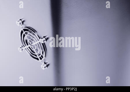 Cooling CPU cooler on a dark casing. Cooling fans are illuminated Stock Photo