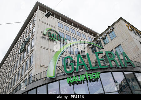 A logo sign outside of a Galeria Kaufhof retail department store in Munich, Germany on August 25, 2018. Stock Photo