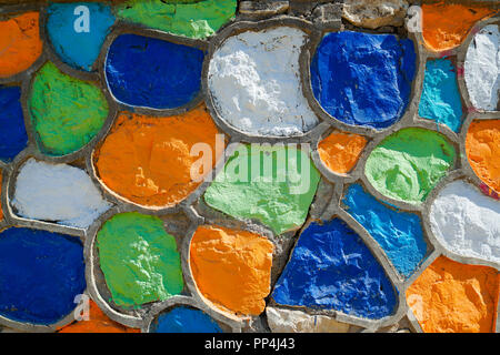 Abstract Grunge multicolored Stone wall Background. Decorative renovation Wall Building of natural stone, Close up. Decoration of the old wall with co Stock Photo