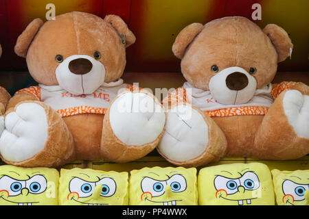 Soft toys for children on the counter of the store Stock Photo